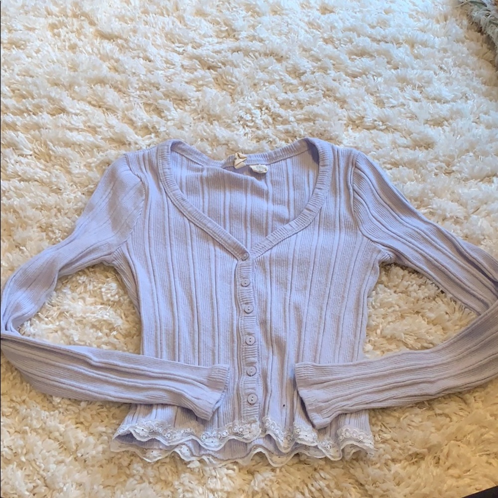 Tight fitting button sweater